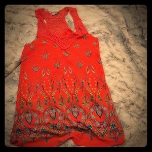 A  nice red top  for a fun and colorful person